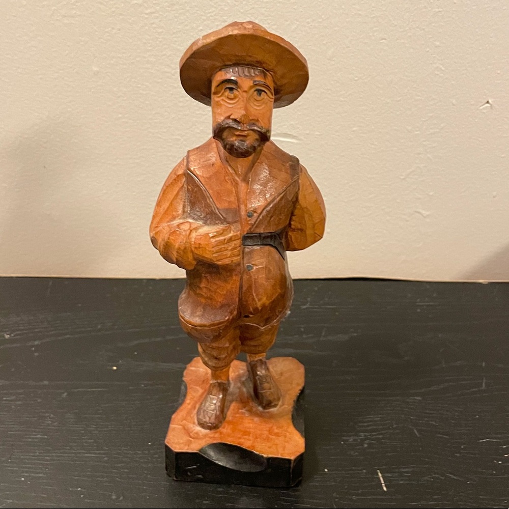 Vintage wooden hand carved folk art figure. No chips or cracks.